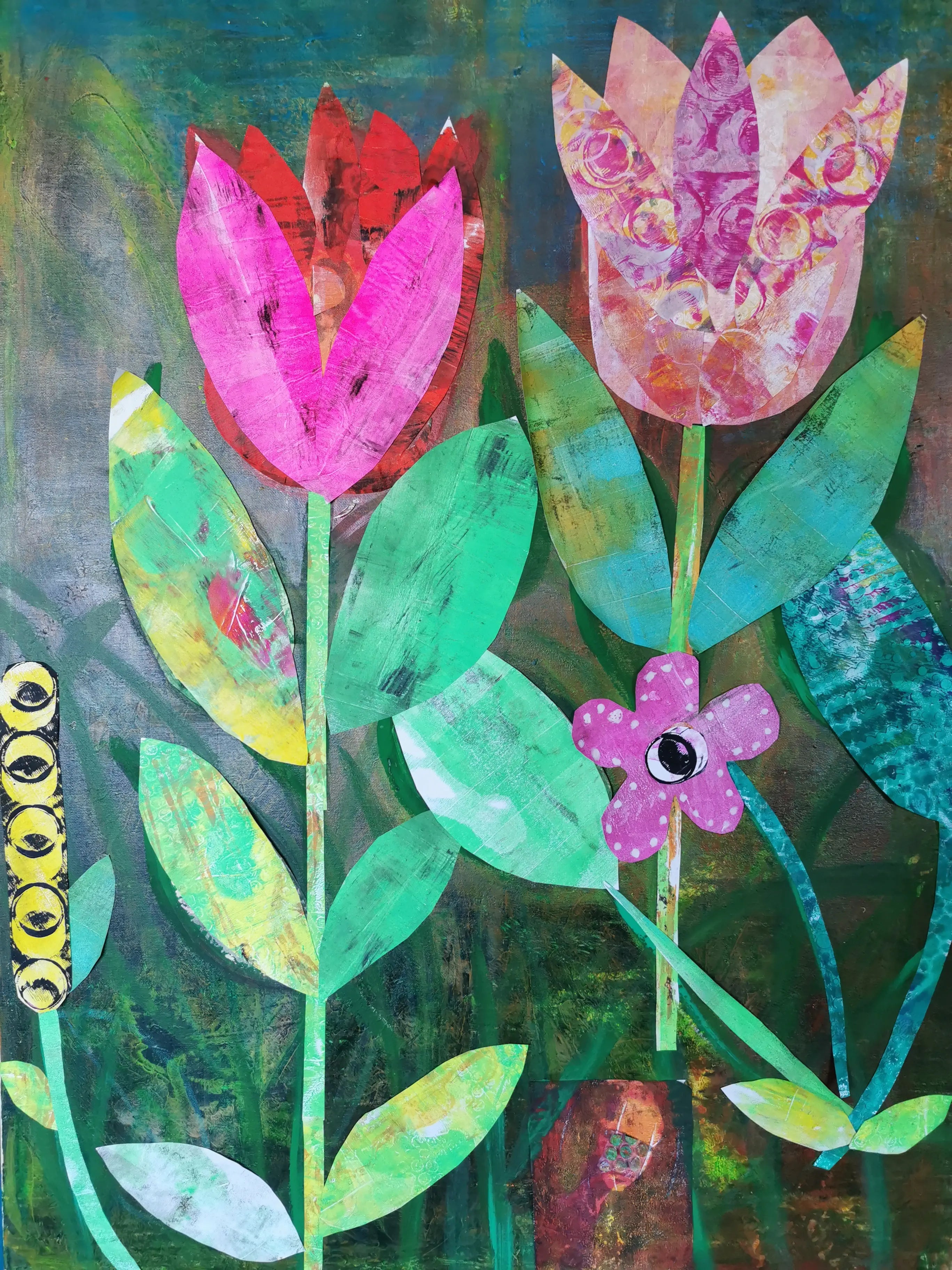 A colorful mixed-media collage of stylized flowers made from painted and patterned paper, featuring bright pink and red petals with layered green leaves against a textured background.